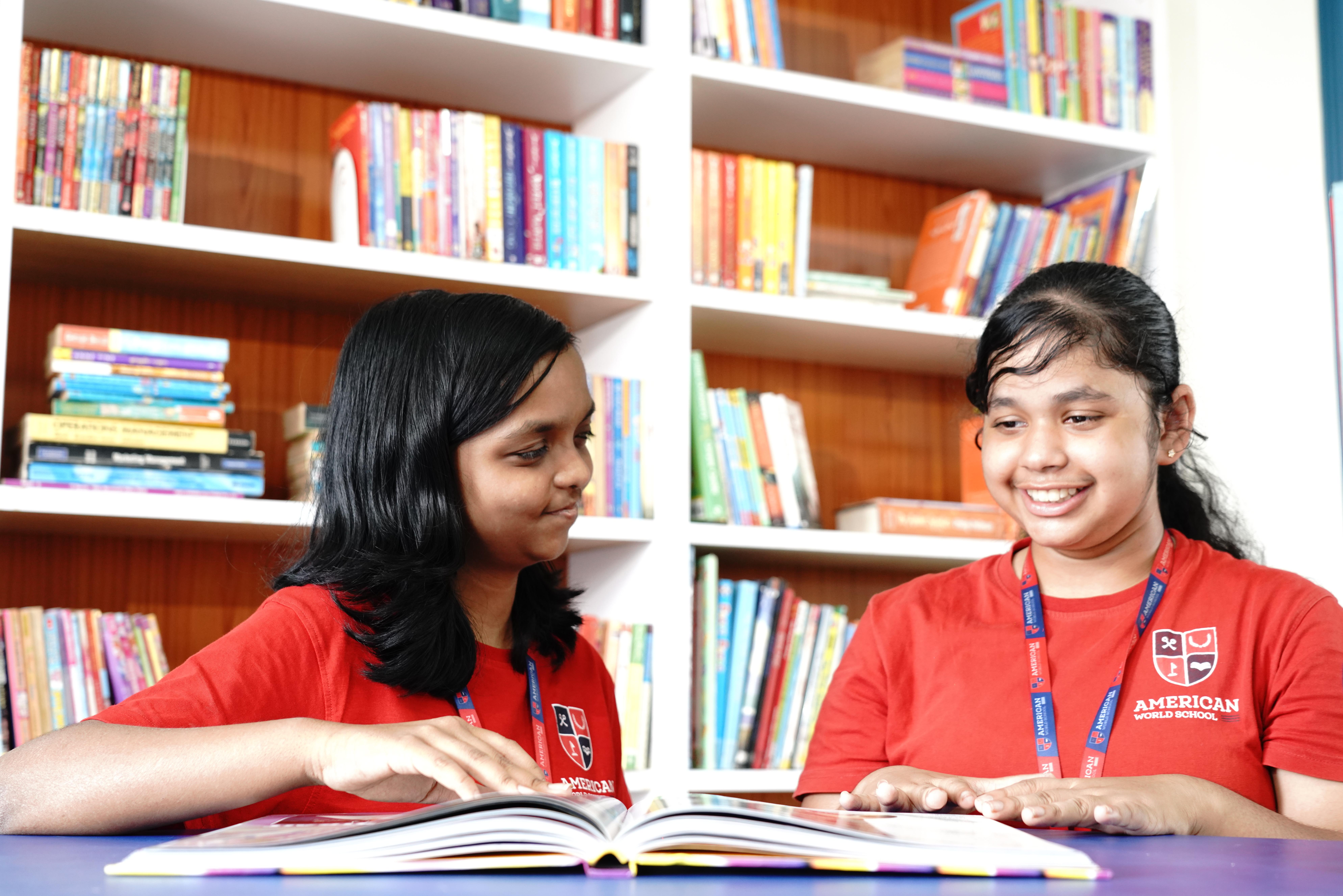 AWS students reading together in library